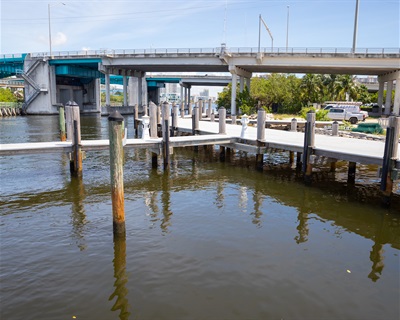 docks in the water looking toward 163 street overpass at Bella Vista Bay Park