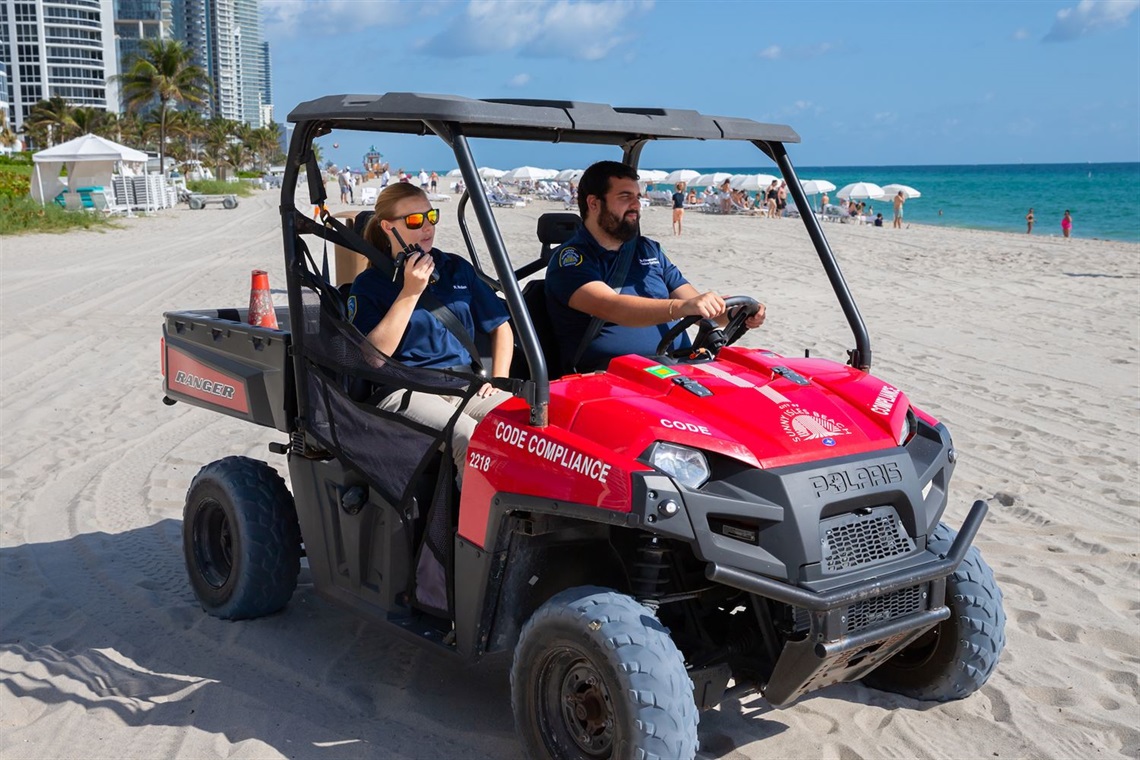 Code Enforcement officers patrolling the beach.