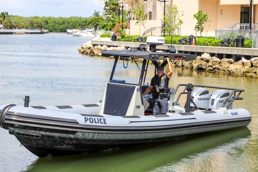 Sgt. Ostrov on a boat, Sunny Isles Beach PD Marine Patrol