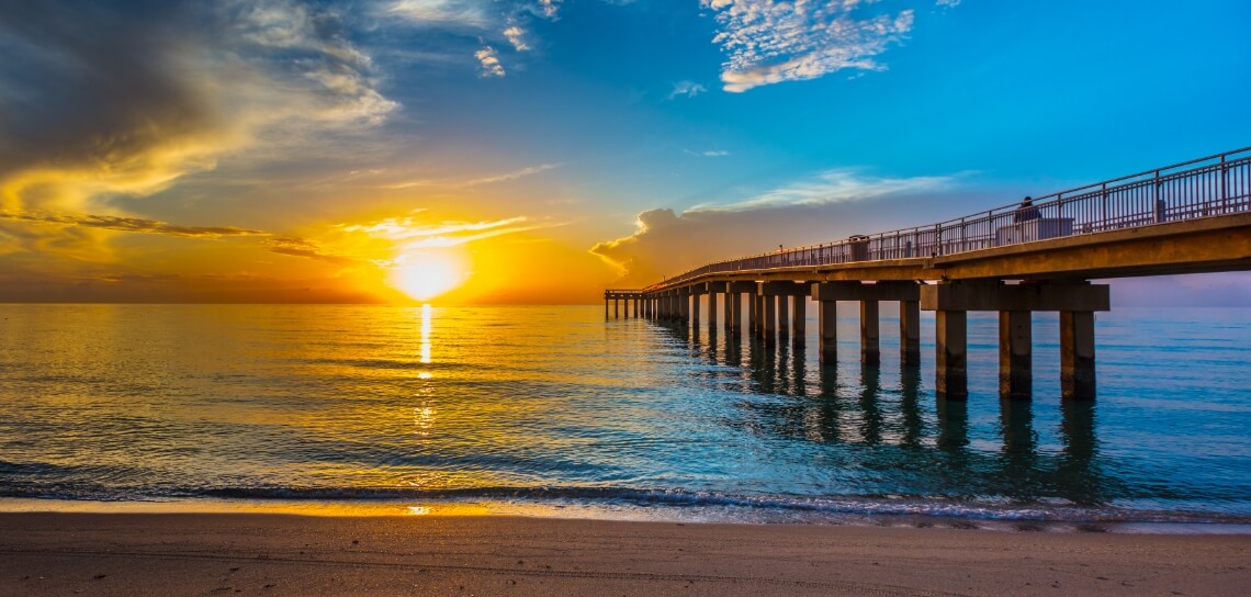 Sunset over a pier